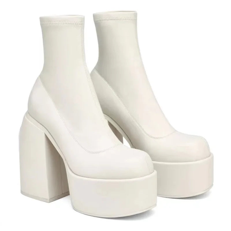 Women’s black leather short boots with square toes, zipper closure, thick soles, and high heels from Plush Fashion Hub.