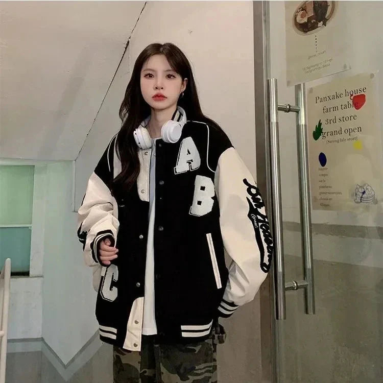 Y2K oversized lamb-wool bomber jacket for women, streetwear style, with a plush, cozy fit in neutral tones.