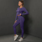 Women's seamless long sleeve yoga top by Plush Fashion Hub, shown in black, made for comfortable activewear and flexible movement.