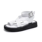 AIYUQI women's genuine leather summer clip toe sandals with Roman-style design and muffin heel, perfect for warm weather.