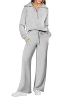 Women two-piece sweatshirt and wide-leg pants set from Plush Fashion Hub, featuring a comfortable, casual style.