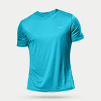 Men's quick-dry compression activewear shirt by Plush Fashion Hub, shown in a close-up of the fitted, moisture-wicking fabric.