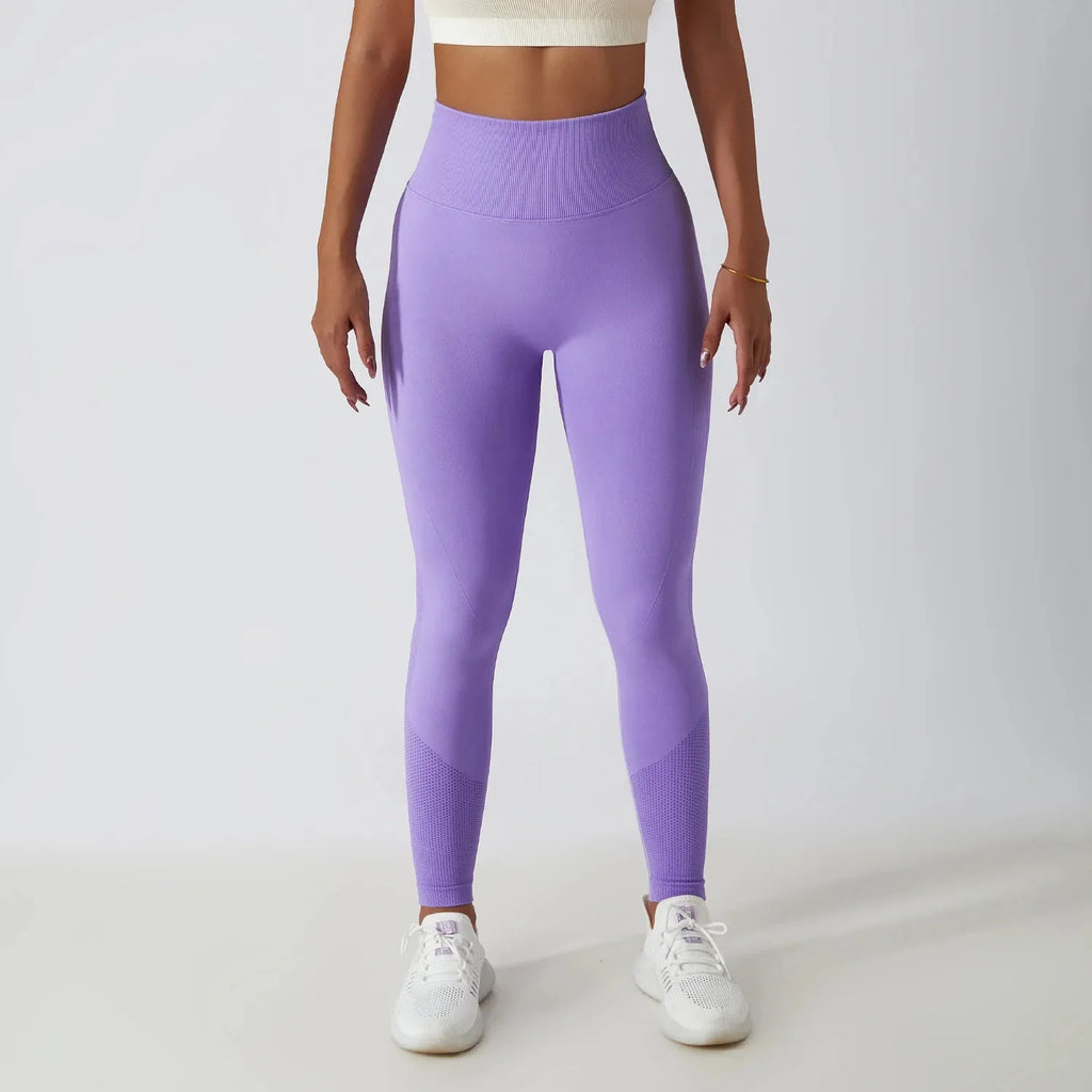 Seamless ribbed yoga leggings by FitiqueFit with tummy control fit, showing the high-waisted, stretchy activewear in soft fabric.