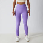 Seamless ribbed yoga leggings by FitiqueFit with tummy control fit, showing the high-waisted, stretchy activewear in soft fabric.