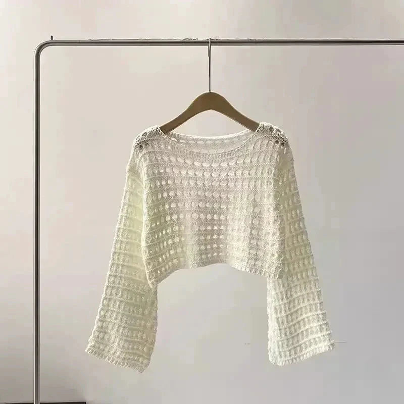 Women’s crochet knit beach cover-up from Plush Fashion Hub, showcasing lightweight casualwear with intricate crochet details.