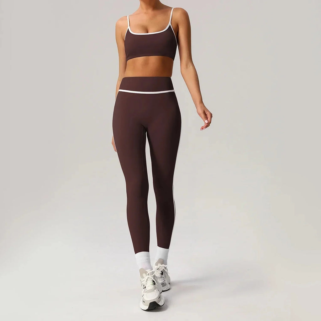 Black seamless yoga set by Plush Fashion Hub featuring high waist and hip-lifting design, suitable for activewear workouts.