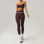 Black seamless yoga set by Plush Fashion Hub featuring high waist and hip-lifting design, suitable for activewear workouts.
