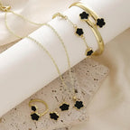 Plum Blossom Plant five-leaf necklace and earring set by Plush Fashion Hub, featuring delicate floral jewelry with five leaf designs.