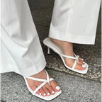 Elegant women's summer French style slip-on slippers with high heels, featuring a clip toe design and fashionable dress shoe appearance.