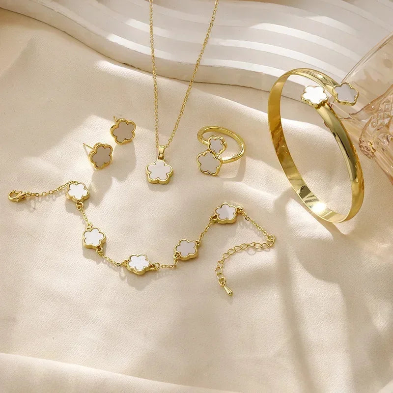 Plum Blossom Plant five leaf necklace and earring set from Plush Fashion Hub, featuring floral jewelry design in a five-piece set.