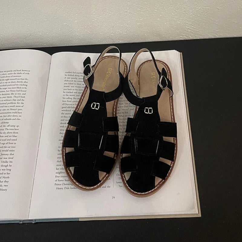 Women's Roman sandals by Plush Fashion Hub featuring flat, retro leather design with hollowed cage details, perfect for summer.