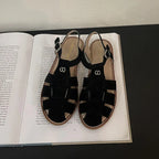 Women's Roman sandals by Plush Fashion Hub featuring flat, retro leather design with hollowed cage details, perfect for summer.