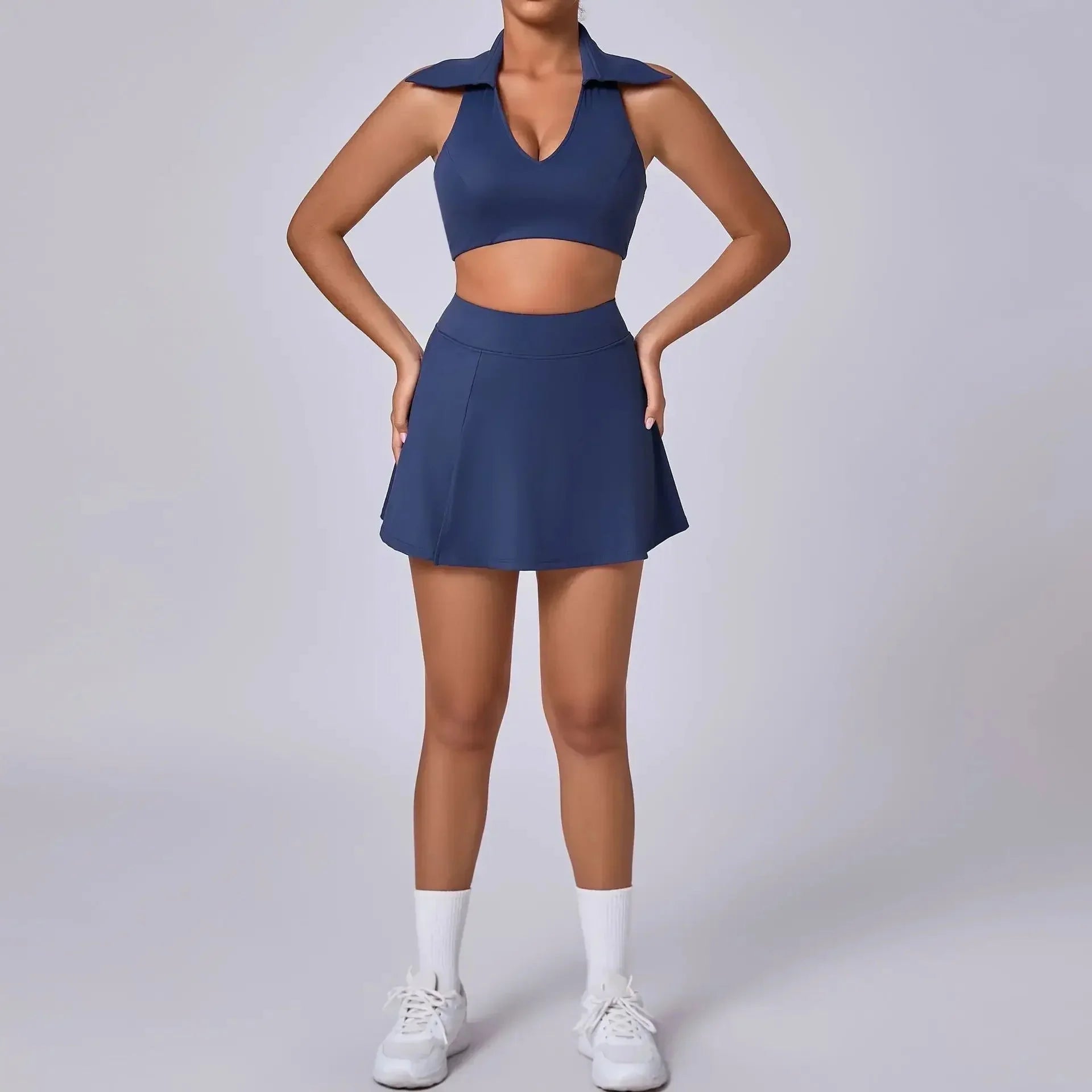 FitiqueFit seamless tennis skirt set with quick-dry activewear fabric, shown in a stylish workout outfit for tennis or exercise.