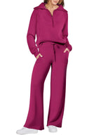 Women two-piece set with sweatshirt and wide-leg pants from Plush Fashion Hub, featuring a comfortable casual style.