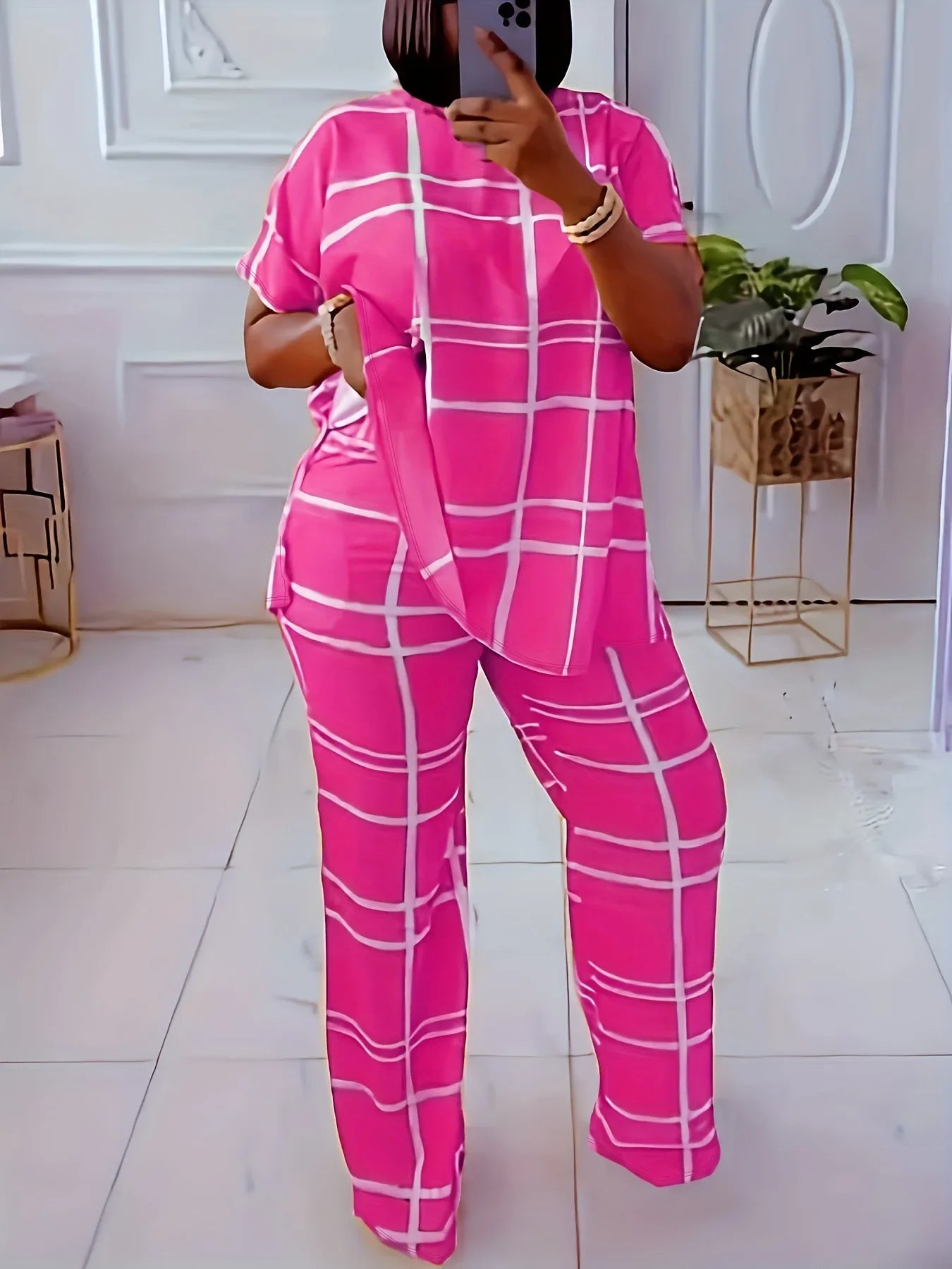 Plus size women's casual two-piece set with striped grid print and round neck, from Plush Fashion Hub.