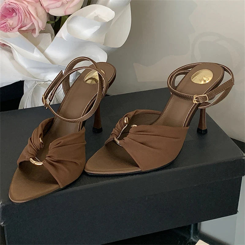 LadyShow.Store women's summer thin heels sandals with pleated design, buckle strap, pointed toe, and hollow-out details.