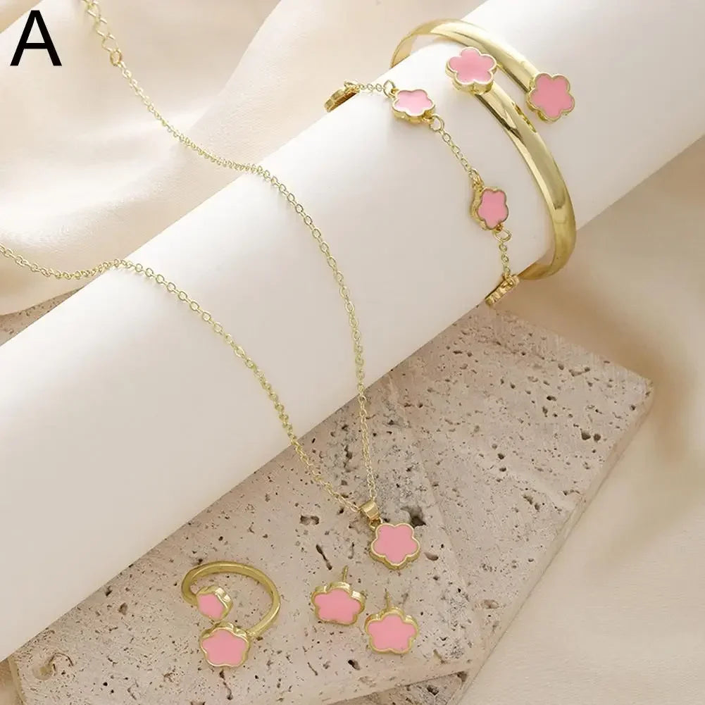 Plum Blossom Plant necklace and earring set featuring five leaf flower charms, crafted by Plush Fashion Hub.