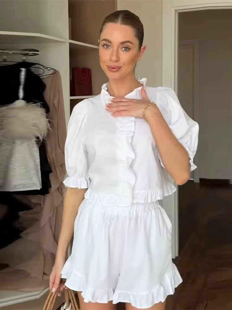 Women's linen-blend ruffled cropped blouse and shorts set by FitiqueFit, shown styled together in a casual summer outfit.