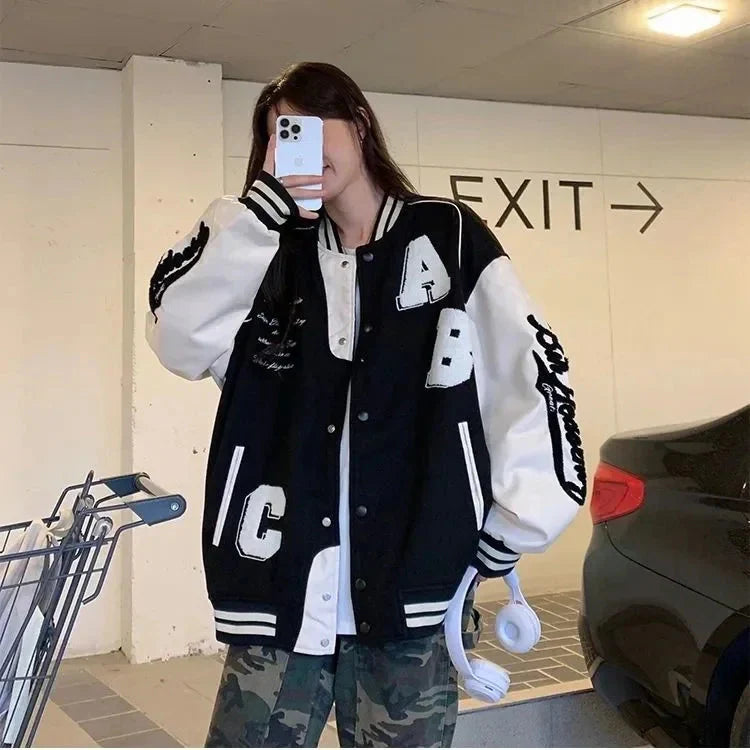 Oversized Y2K Lamb-Wool Bomber Jacket for women by FitiqueFit, featuring a streetwear style and cozy wool texture.