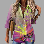 Mardi Gras women's V-neck long sleeve carnival print shirt by FitiqueFit, featuring colorful festive patterns for casual wear.