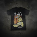 Korn 'Issues' graphic T-shirt by FitiqueFit, unisex streetwear with bold band artwork on a black fabric background.