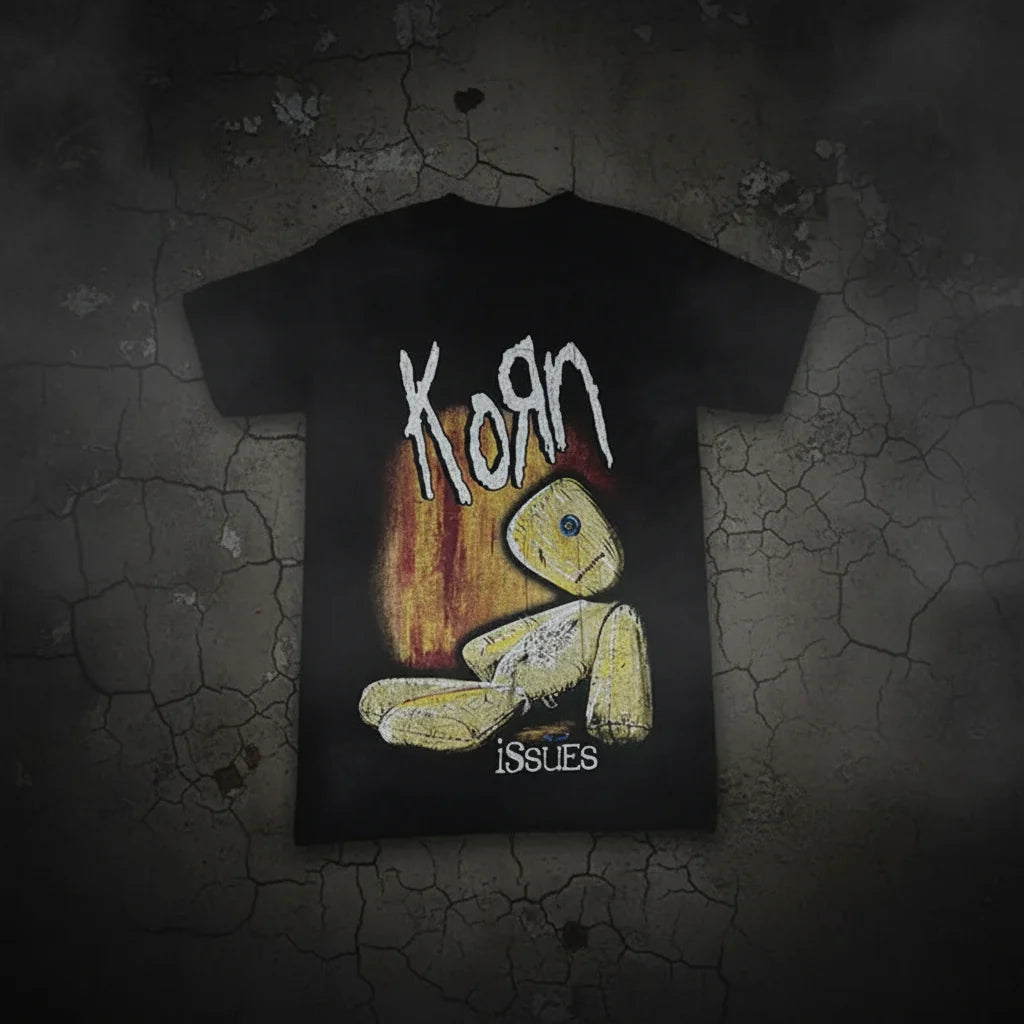 Korn 'Issues' graphic T-shirt by FitiqueFit, unisex streetwear with bold band artwork on a black fabric background.