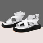 AIYUQI women’s genuine leather summer clip toe sandals with Roman-inspired design and muffin-style soles.