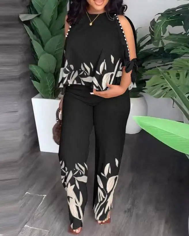 Plus size women's two-piece fashion set with short sleeves, stylish and comfortable outfit by Plush Fashion Hub.