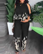 Plus size women's two-piece fashion set with short sleeves, stylish and comfortable outfit by Plush Fashion Hub.