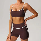 Black seamless yoga set with high waist and hip-lifting design from Plush Fashion Hub, shown on a model in activewear pose.