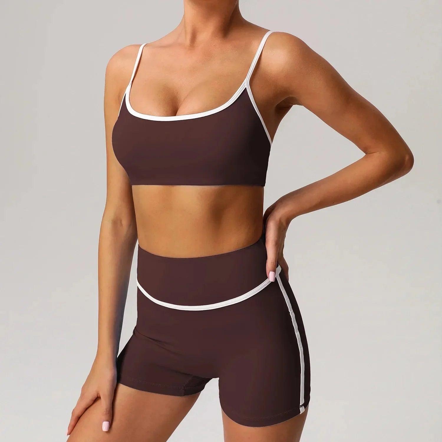 Black seamless yoga set with high waist and hip-lifting design from Plush Fashion Hub, shown on a model in activewear pose.