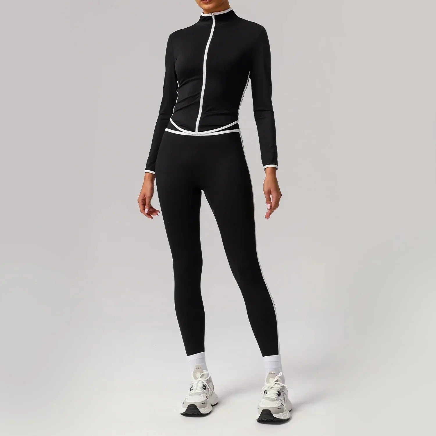 Black seamless yoga set with high waist and hip-lifting design from Plush Fashion Hub, shown on a model.