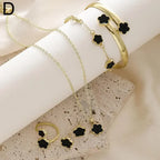 Plum Blossom Plant five-leaf necklace and earring set featuring floral jewelry from Plush Fashion Hub, displayed on a white background.