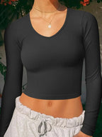 FitiqueFit SculptFit long sleeve yoga crop top shown in casualwear style, featuring a fitted design and comfortable fabric.