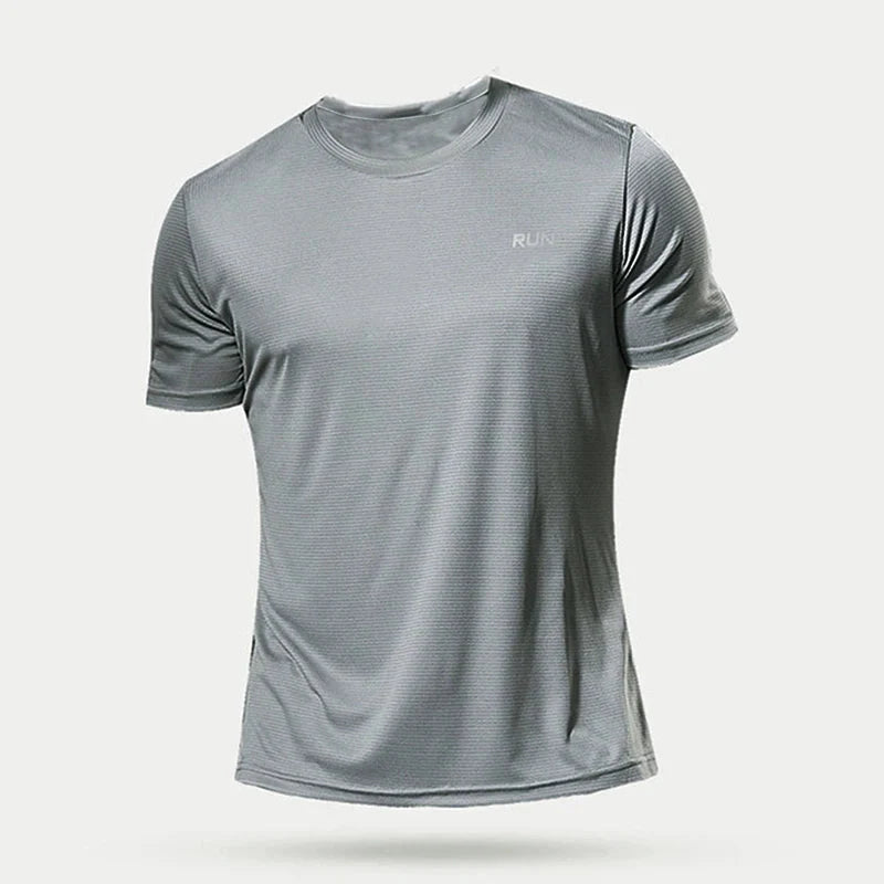 Men's quick-dry compression shirt in black, designed for activewear, from Plush Fashion Hub, shown on a mannequin.