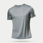 Men's quick-dry compression shirt in black, designed for activewear, from Plush Fashion Hub, shown on a mannequin.