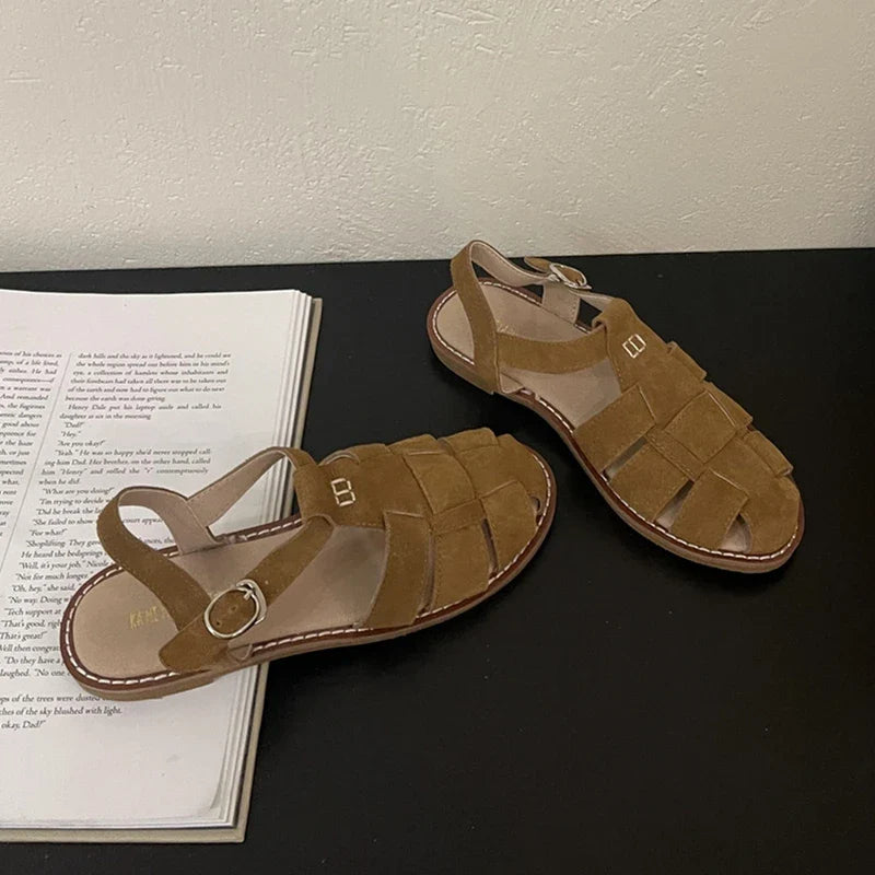 Dimanyu women's Roman sandals by Plush Fashion Hub, 2023 summer flat leather cage shoes with hollowed retro design.