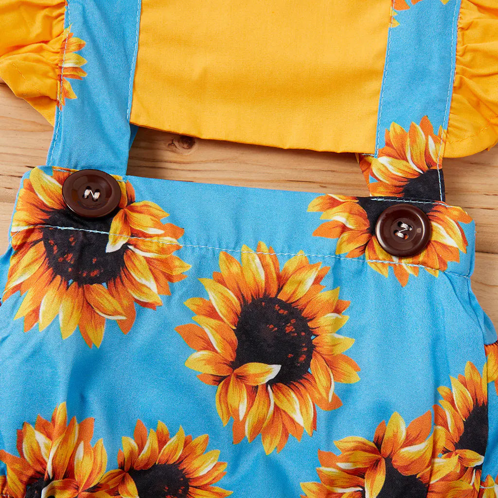 Girls' jumpsuit with suspenders from Trendy Attic Store01, featuring a stylish and comfortable design for young girls.
