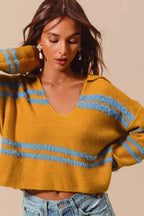 Fuzzy striped deep U-neck sweater for women by Plush Fashion Hub, soft knit pullover with cozy, plush texture and vibrant stripe pattern.