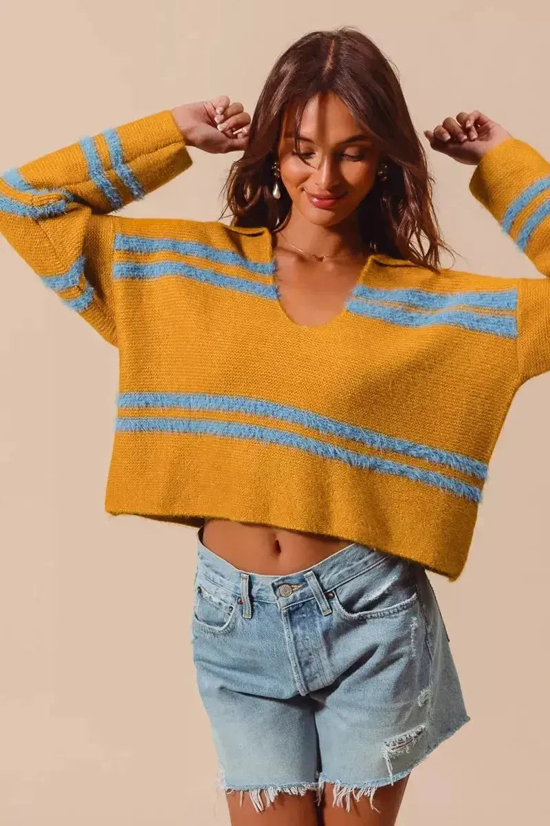 Fuzzy striped deep U-neck women's sweater by Plush Fashion Hub, featuring soft knit material and cozy, stylish design.