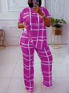 Plus size women’s casual two-piece set with striped grid print and round neck top from Plush Fashion Hub.
