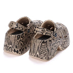 Leopard print thick-bottom clogs for women with closed toe, chunky platform heel, and high wedge design, summer 2023 footwear.