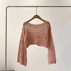 Women’s crochet knit beach cover-up from Plush Fashion Hub, casualwear with intricate crochet pattern and lightweight, breezy design.