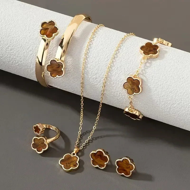 Plum Blossom Plant five leaf necklace and earring set from Plush Fashion Hub, featuring floral jewelry with delicate plum blossom design.