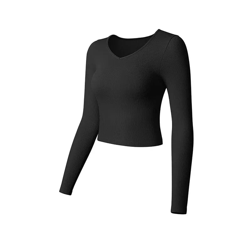 Plush Fashion Hub SculptFit long sleeve yoga crop top in casualwear style, shown in a sleek black fabric with fitted design.