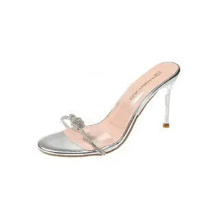Women crystal gladiator sandals with ankle strap, high heels, hollow out design, closed toe stilettos, perfect for parties.
