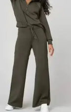 Women two-piece sweatshirt and wide-leg pants set by Plush Fashion Hub, casual loungewear with cozy sweatshirt and flowing pants.
