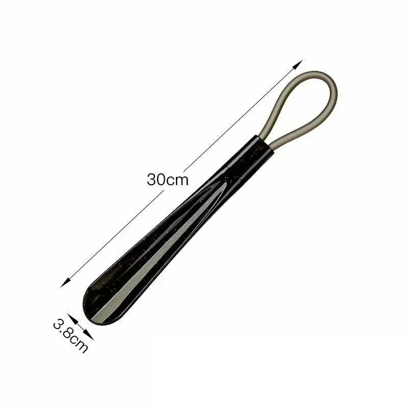 Flexible plastic shoe horn from Plush Fashion Hub, extra long, durable, ideal for pregnant women and shoe assistance.