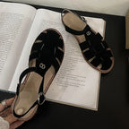Women's Roman leather sandals by LadyShow.Store, 2023 summer flat retro cage shoes with hollowed design and stylish women's footwear.
