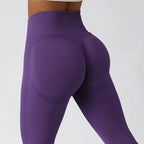 Seamless ribbed yoga leggings by FitiqueFit featuring tummy control fit, stretchy activewear with high waist and ribbed texture.